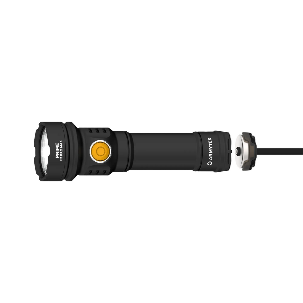 A black Armytek PRIME flashlight shown horizontally against a solid gray background, with its battery connector cap removed and displayed alongside.
